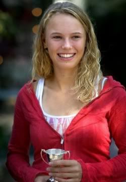 caroline wozniacki smiling with cup